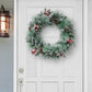 24 in Sterling Spruce Wreath with White Frosted Branch Tips and Sliver Glitter Accents Pinecones and Red Berries Indoor/Outdoor Use Blue/Green